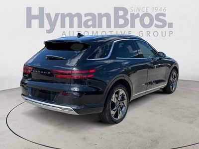 2023 Genesis Electrified GV70 — rear three-quarter view