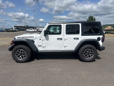2024 Jeep Wrangler — rear three-quarter view
