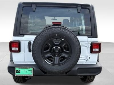 2026 Jeep Wrangler — rear three-quarter view