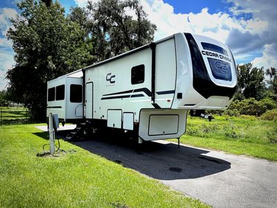 2023 Forest River Cedar Creek Experience — side profile view