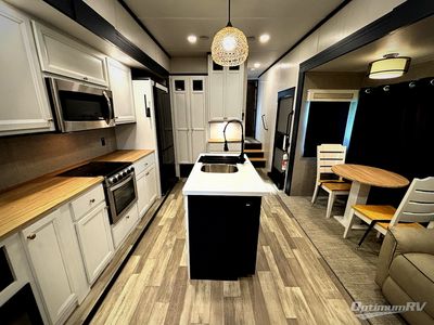 2023 Forest River Cedar Creek Experience — front three-quarter view