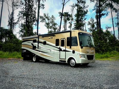 2011 Tiffin Allegro — side profile view