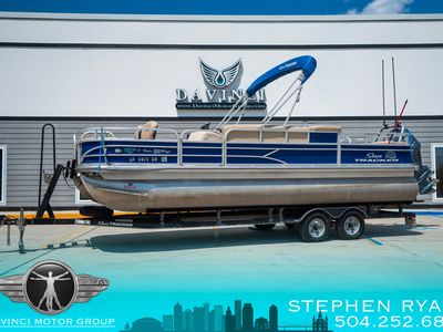 2017 Sun Tracker 22DLX Fishing Barge in Blue / Tan — front three-quarter view