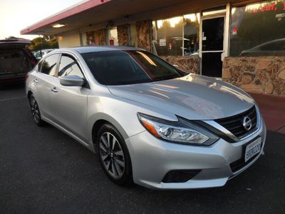 2018 Nissan Altima in Silver — front three-quarter view
