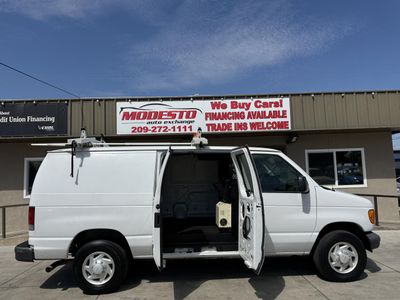 2007 Ford E-Series Van — rear three-quarter view