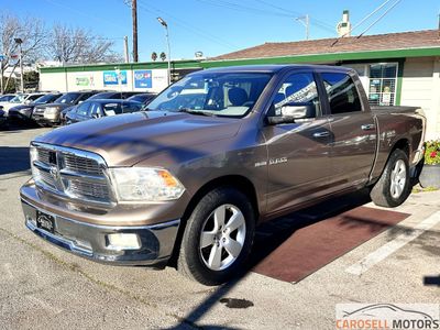 2010 Dodge Ram 1500 in Met. Brown — front three-quarter view