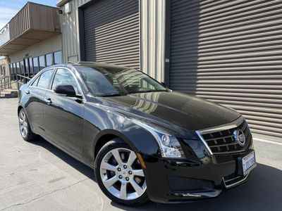 2014 Cadillac ATS in Black — front three-quarter view