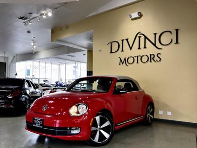 2013 Volkswagen Beetle Convertible — side profile view