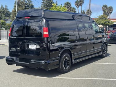 2013 Chevrolet Express — rear three-quarter view
