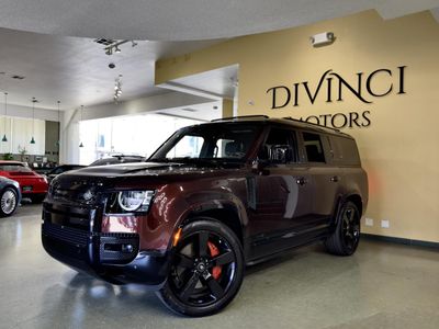 2023 Land Rover Defender in Maroon — front three-quarter view