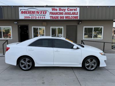 2014 Toyota Camry — side profile view