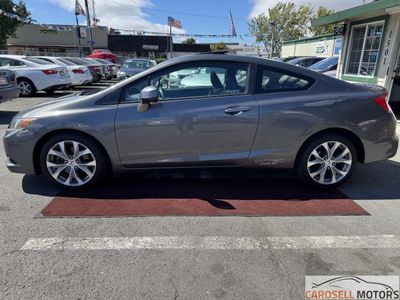 2012 Honda Civic — rear three-quarter view