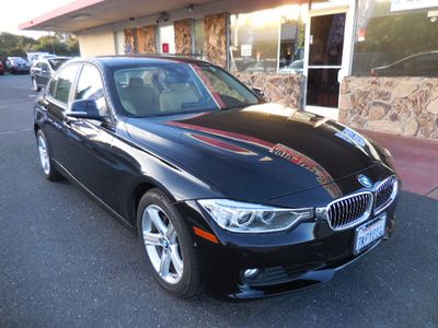2015 BMW 3 Series in Black — front three-quarter view