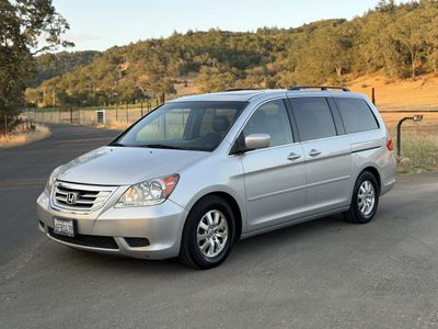 2010 Honda Odyssey in Silver — front three-quarter view