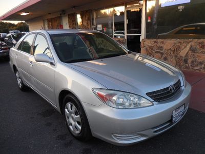 2003 Toyota Camry in Silver — front three-quarter view