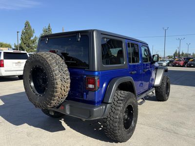 2018 Jeep Wrangler — rear three-quarter view