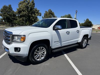 2015 GMC Canyon in White — front three-quarter view