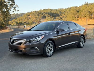 2015 Hyundai Sonata in Brown — front three-quarter view