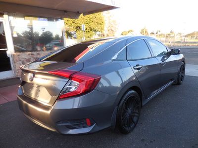2016 Honda Civic — rear three-quarter view