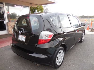 2013 Honda Fit — rear three-quarter view