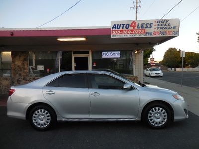 2012 Toyota Camry — side profile view