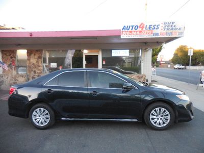 2013 Toyota Camry — side profile view