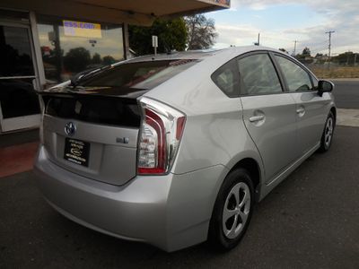 2013 Toyota Prius Four — rear three-quarter view