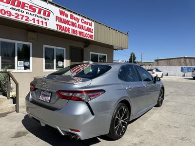 2019 Toyota Camry — rear three-quarter view