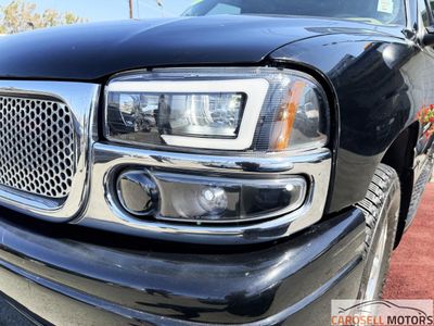 2002 GMC Yukon — rear three-quarter view