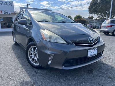 2012 Toyota Prius-v in Magnetic Gray Metallic — front three-quarter view