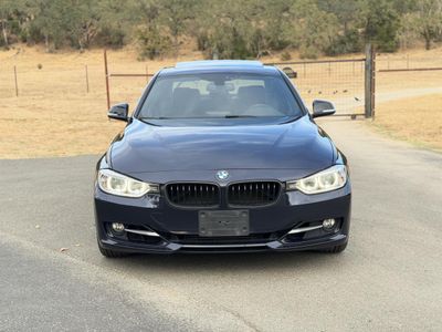 2013 BMW 3 Series — rear three-quarter view