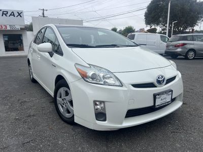 2011 Toyota Prius in Blizzard Pearl — front three-quarter view