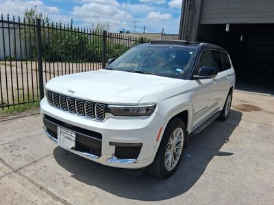 2023 Jeep Grand Cherokee L in White — front three-quarter view