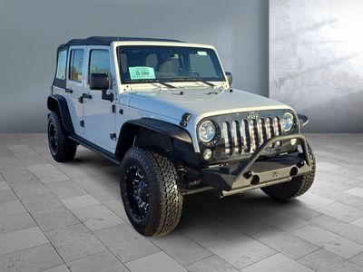 2016 Jeep Wrangler Unlimited — front three-quarter view