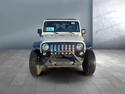 2016 Jeep Wrangler Unlimited — rear three-quarter view