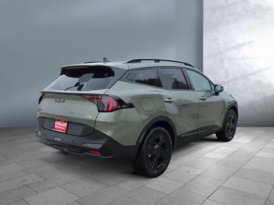 2026 Kia Sportage Plug-In Hybrid — rear three-quarter view