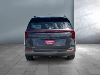 2026 Kia Carnival — rear three-quarter view