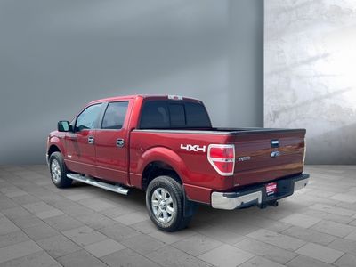 2014 Ford F-150 — rear three-quarter view