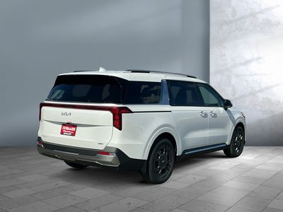 2026 Kia Carnival Hybrid — front three-quarter view