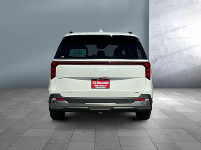 2026 Kia Carnival Hybrid — rear three-quarter view