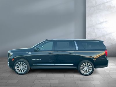 2023 GMC Yukon XL — rear three-quarter view