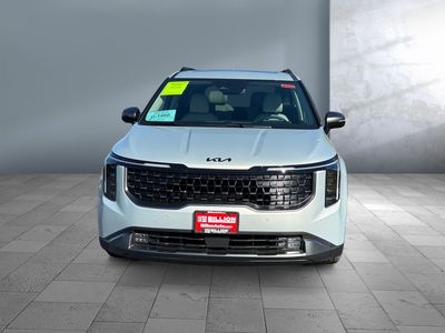 2026 Kia Carnival — rear three-quarter view