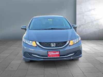 2015 Honda Civic Sedan — rear three-quarter view