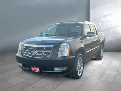 2011 Cadillac Escalade EXT — front three-quarter view