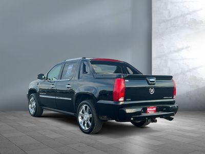 2011 Cadillac Escalade EXT — rear three-quarter view