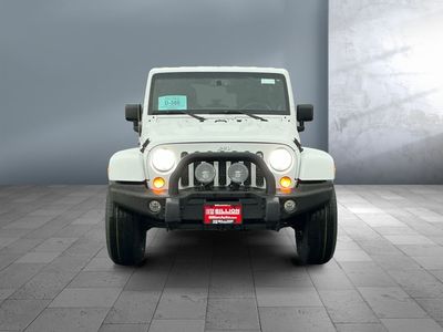 2013 Jeep Wrangler Unlimited — rear three-quarter view