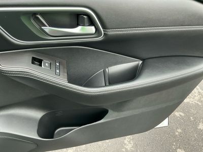 2025 Nissan Rogue — rear three-quarter view