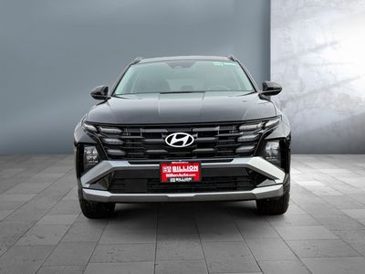 2025 Hyundai Tucson Hybrid — side profile view