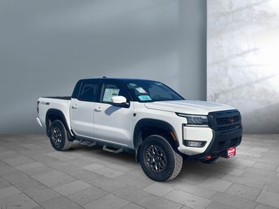 2026 Nissan Frontier — front three-quarter view