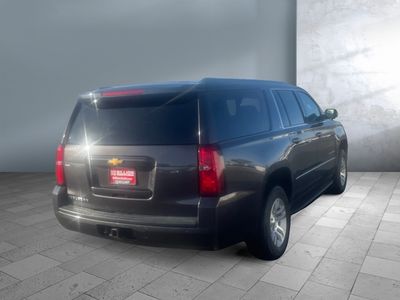 2015 Chevrolet Suburban — rear three-quarter view